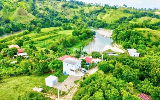 Turnkey Riverfront Retreat | 2 Homes • Income Ready • Mountain Views